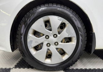 Подержанный автомобиль Kia Rio Sedan 2016 года (12 фото)