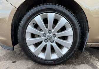 Подержанный автомобиль Opel Astra Sedan 2013 года (12 фото)