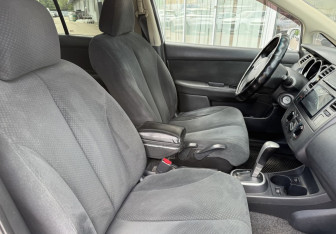 Подержанный автомобиль Nissan Tiida Sedan 2013 года (10 фото)