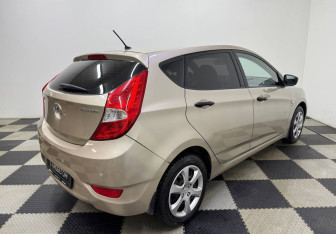 Подержанный автомобиль Hyundai Solaris Hatchback 2013 года (5 фото)