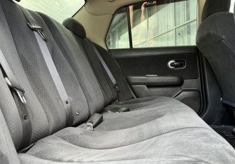 Подержанный автомобиль Nissan Tiida Sedan 2013 года (11 фото)