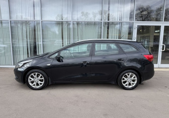 Подержанный автомобиль Kia Ceed Wagon 2014 года (8 фото)