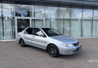 Подержанный автомобиль Mitsubishi Lancer Sedan 2006 года (3 фото)