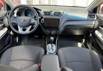 Подержанный автомобиль Kia Rio Hatchback 2014 года (9 фото)