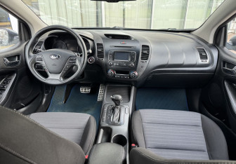 Подержанный автомобиль Kia Cerato Coupe 2013 года (9 фото)