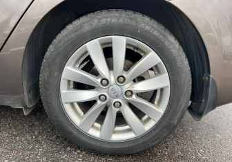 Подержанный автомобиль Kia Cerato Sedan 2014 года (12 фото)