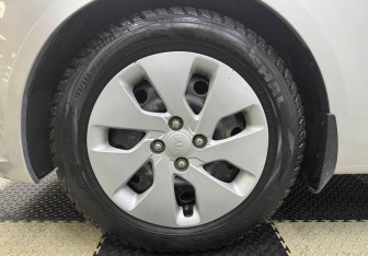 Подержанный автомобиль Kia Rio Sedan 2014 года (12 фото)