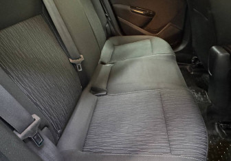 Подержанный автомобиль Opel Astra Sedan 2014 года (11 фото)