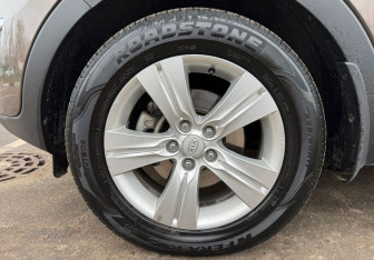 Подержанный автомобиль Kia Sportage 2012 года (12 фото)