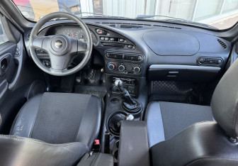 Подержанный автомобиль Chevrolet Niva 2013 года (9 фото)