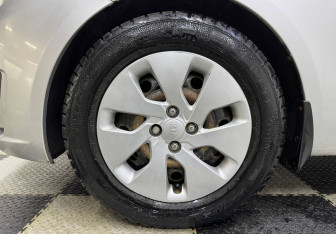 Подержанный автомобиль Kia Rio Sedan 2011 года (12 фото)