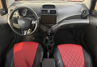 Подержанный автомобиль Chevrolet Spark 2011 года (9 фото)