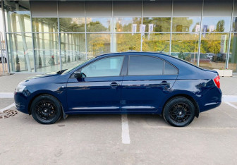 Подержанный автомобиль Skoda Rapid Liftback 2016 года (8 фото)