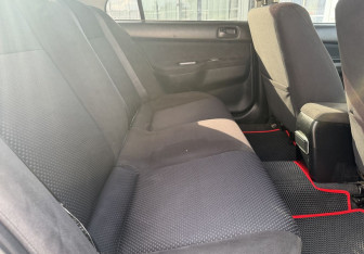 Подержанный автомобиль Mitsubishi Lancer Sedan 2006 года (11 фото)