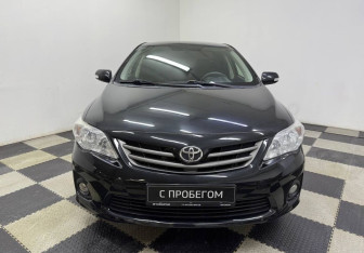 Подержанный автомобиль Toyota Corolla Sedan 2013 года (2 фото)