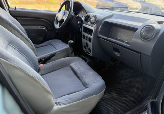 Подержанный автомобиль Renault Logan Sedan 2007 года (10 фото)