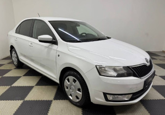 Подержанный автомобиль Skoda Rapid Liftback 2014 года (3 фото)