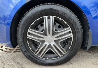 Подержанный автомобиль Kia Rio Hatchback 2013 года (12 фото)