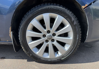 Подержанный автомобиль Opel Astra Wagon 2012 года (12 фото)