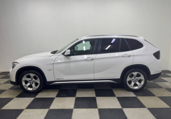 Подержанный автомобиль BMW X1 2011 года (8 фото)