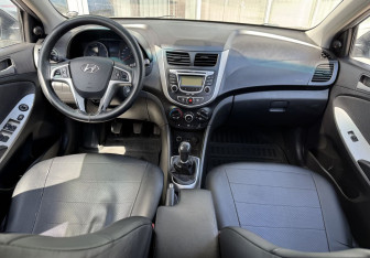 Подержанный автомобиль Hyundai Solaris Hatchback 2011 года (9 фото)