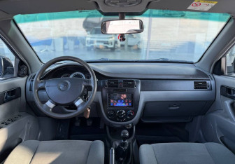 Подержанный автомобиль Daewoo Gentra Sedan 2013 года (9 фото)