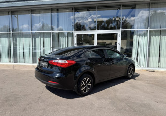 Подержанный автомобиль Kia Cerato Sedan 2014 года (5 фото)