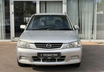 Подержанный автомобиль Mazda Demio 2002 года (2 фото)
