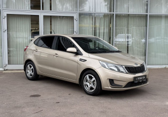 Подержанный автомобиль Kia Rio Hatchback 2013 года (3 фото)