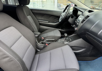 Подержанный автомобиль Kia Cerato Coupe 2013 года (10 фото)