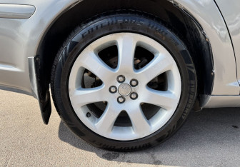 Подержанный автомобиль Toyota Avensis Sedan 2006 года (12 фото)