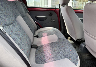 Подержанный автомобиль Daewoo Matiz 2013 года (11 фото)