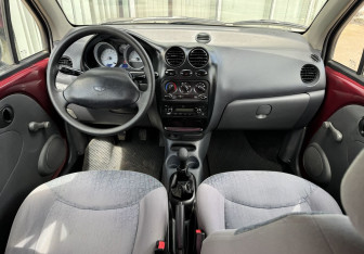 Подержанный автомобиль Daewoo Matiz 2013 года (9 фото)