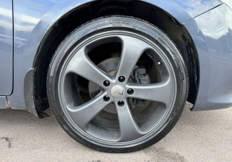 Подержанный автомобиль Kia Cerato Coupe 2013 года (12 фото)