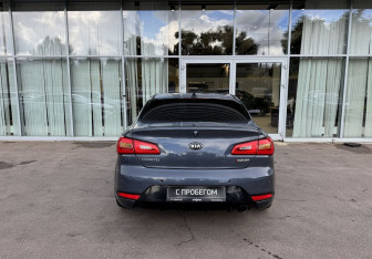 Подержанный автомобиль Kia Cerato Coupe 2013 года (6 фото)