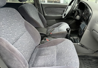 Подержанный автомобиль Kia Spectra Sedan 2007 года (10 фото)