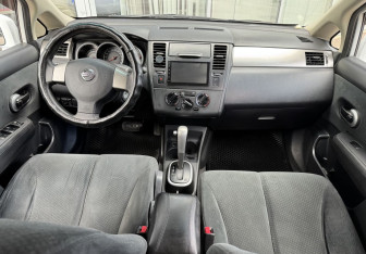 Подержанный автомобиль Nissan Tiida Sedan 2013 года (9 фото)