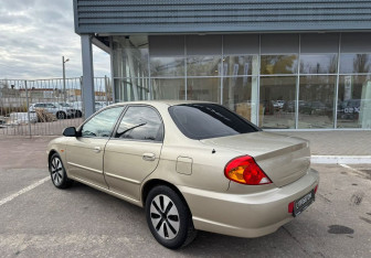 Подержанный автомобиль Kia Spectra Sedan 2008 года (7 фото)