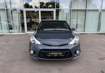 Подержанный автомобиль Kia Cerato Coupe 2013 года (2 фото)