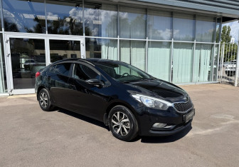 Подержанный автомобиль Kia Cerato Sedan 2014 года (3 фото)