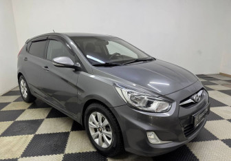 Подержанный автомобиль Hyundai Solaris Hatchback 2012 года (3 фото)