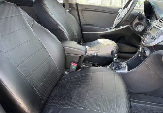 Подержанный автомобиль Hyundai Solaris Hatchback 2011 года (10 фото)