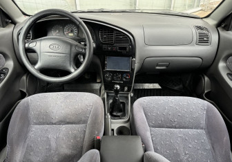 Подержанный автомобиль Kia Spectra Sedan 2007 года (9 фото)