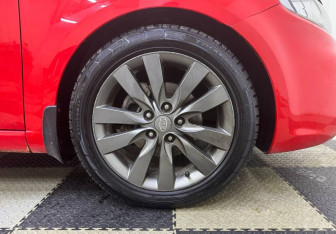 Подержанный автомобиль Kia Cerato Coupe 2011 года (12 фото)