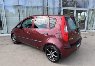 Подержанный автомобиль Mitsubishi Colt Hatchback 2005 года (7 фото)