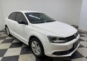Подержанный автомобиль Volkswagen Jetta Sedan 2014 года (3 фото)