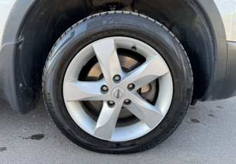 Подержанный автомобиль Nissan Qashqai 2013 года (12 фото)