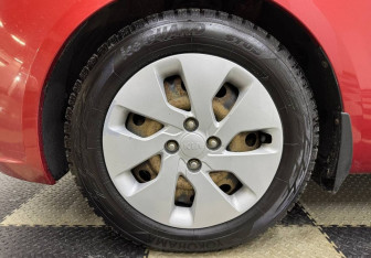 Подержанный автомобиль Kia Rio Sedan 2014 года (12 фото)