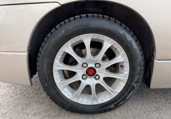 Подержанный автомобиль Suzuki Liana Sedan 2006 года (12 фото)