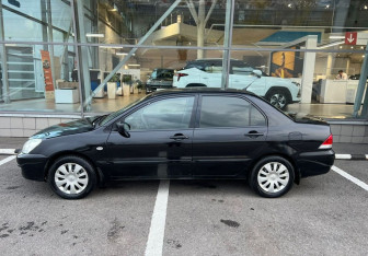 Подержанный автомобиль Mitsubishi Lancer Sedan 2006 года (8 фото)